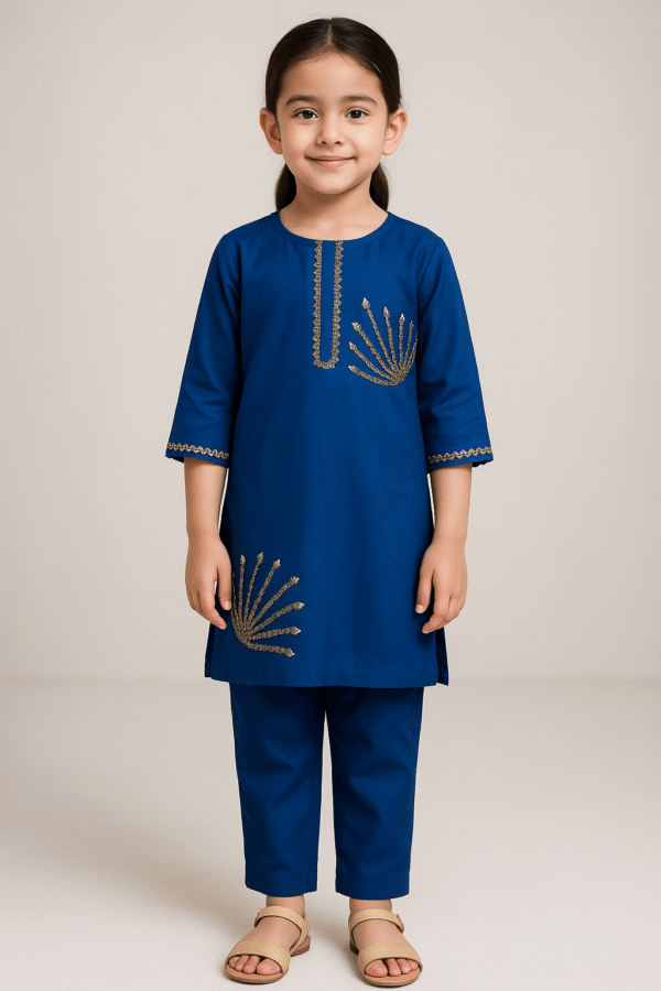 Little girl wearing a royal blue traditional kurta and trouser set with golden gota embroidery, perfect for festive or formal occasions